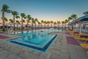 Outdoor pool, pool umbrellas, sun loungers