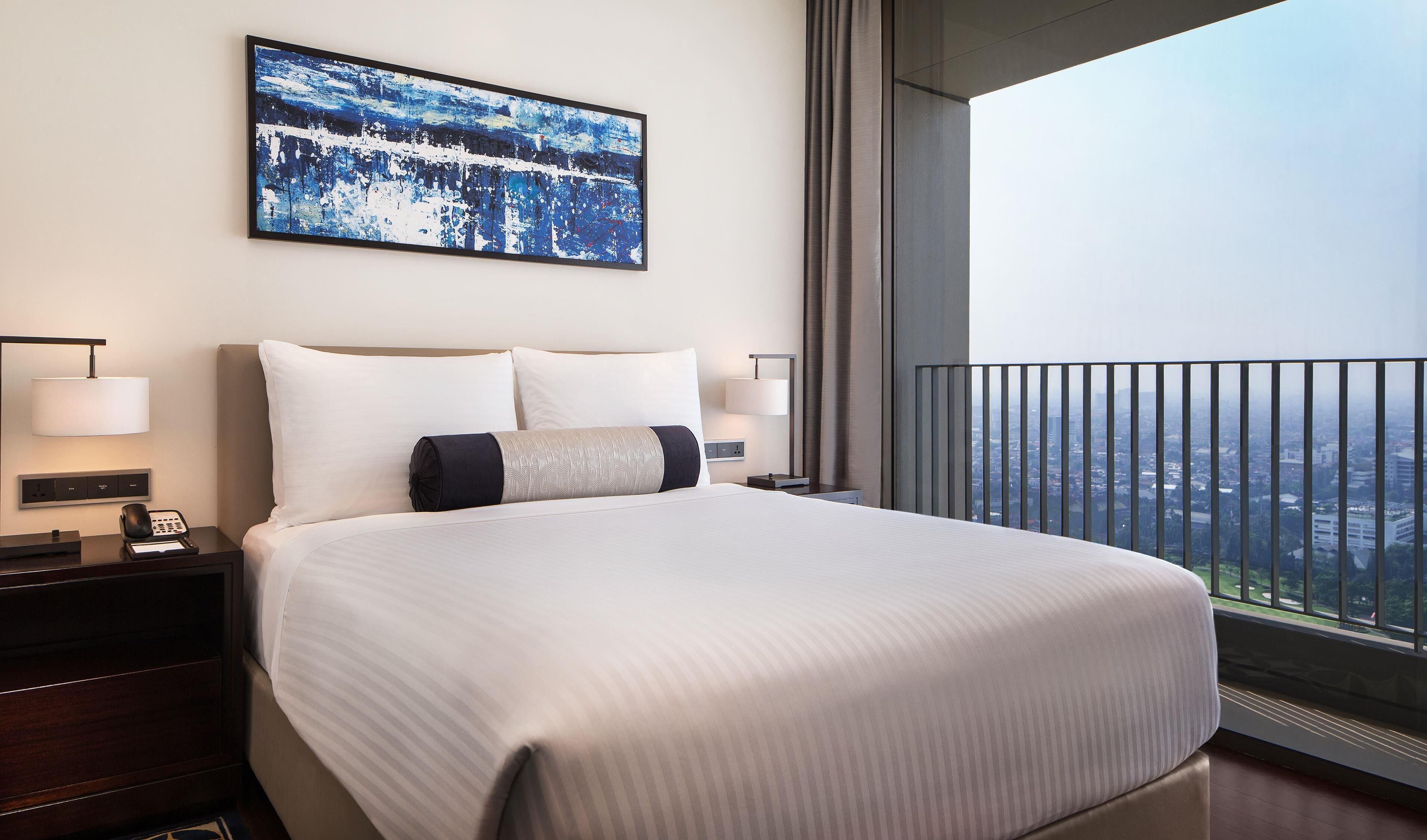 Suite, 2 soverom | Sengetøy av topp kvalitet, minibar, safe på rommet og skrivebord