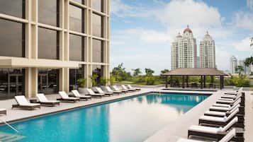 Outdoor pool, free cabanas, pool umbrellas