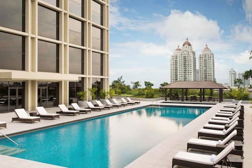 Outdoor pool, free pool cabanas, pool umbrellas
