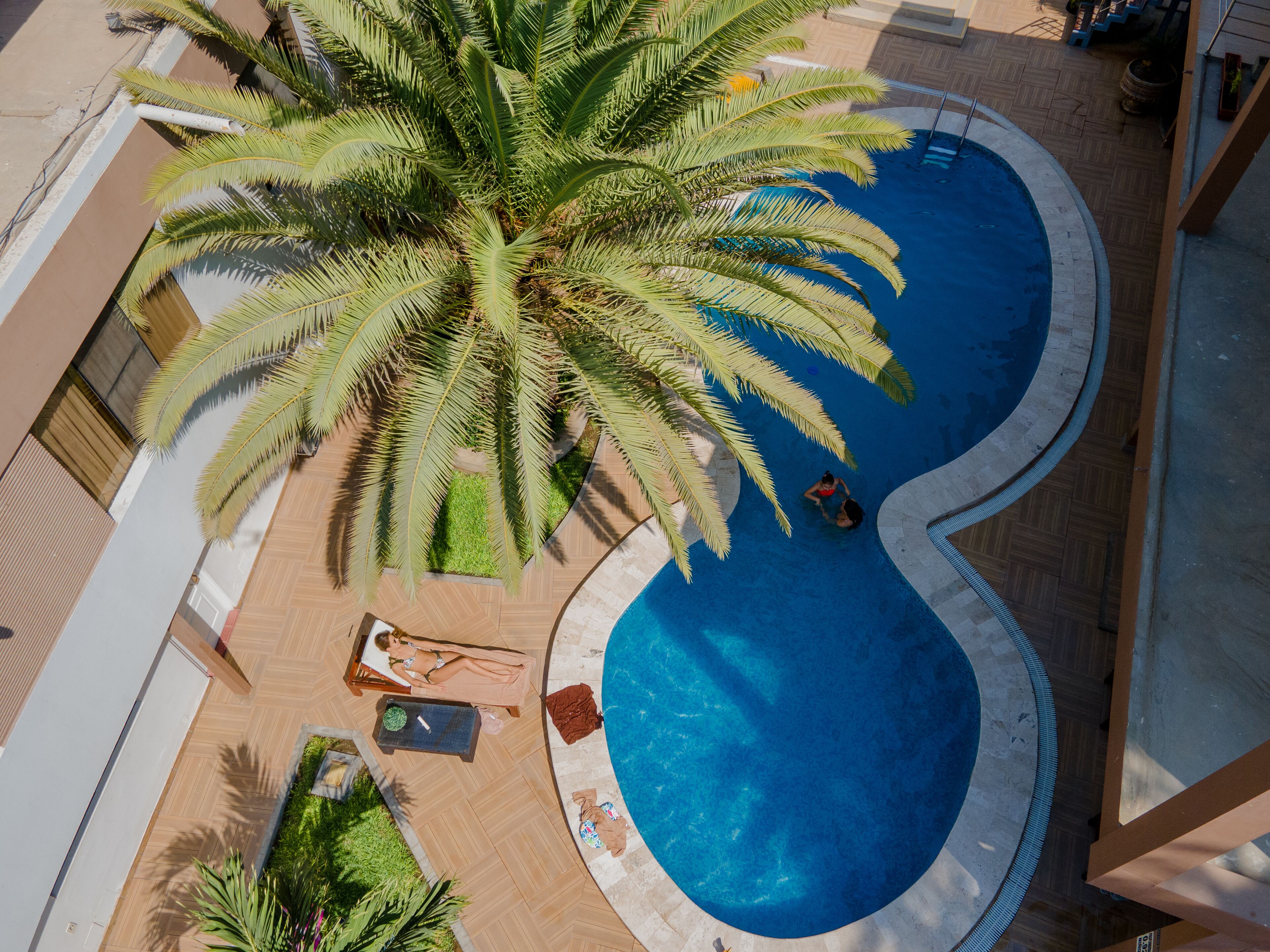 indoor pool, outdoor pool, pool loungers