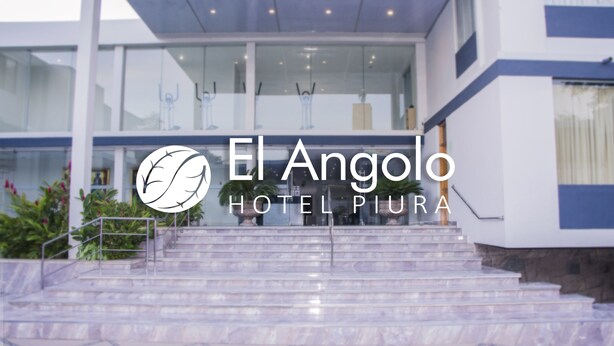 The entrance of El Angelo Hotel Piura with marble steps and glass railings. - El Angolo Hotel Piura (Piura)