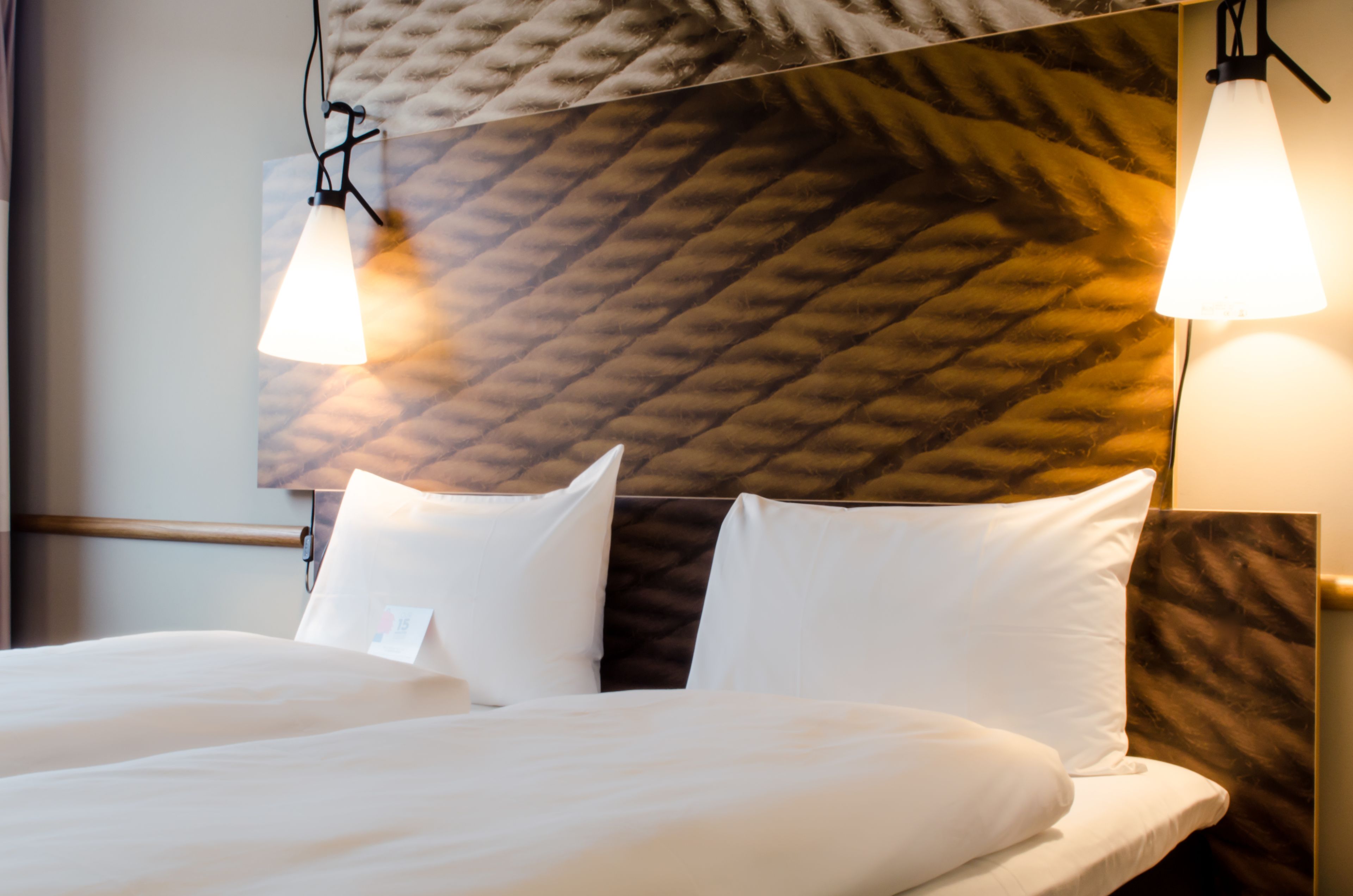 Premium bedding, pillow-top beds, desk, blackout curtains