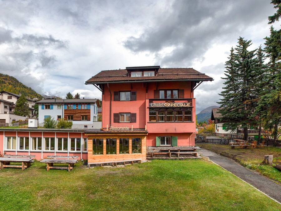 A two-story building with a sign reading "Chalet SPECIAL Ristorante."
