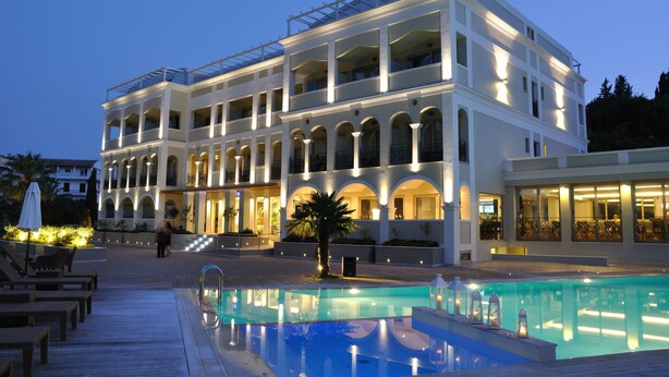 A large hotel with multiple balconies and a swimming pool. - Corfu Mare Hotel (Corfu)
