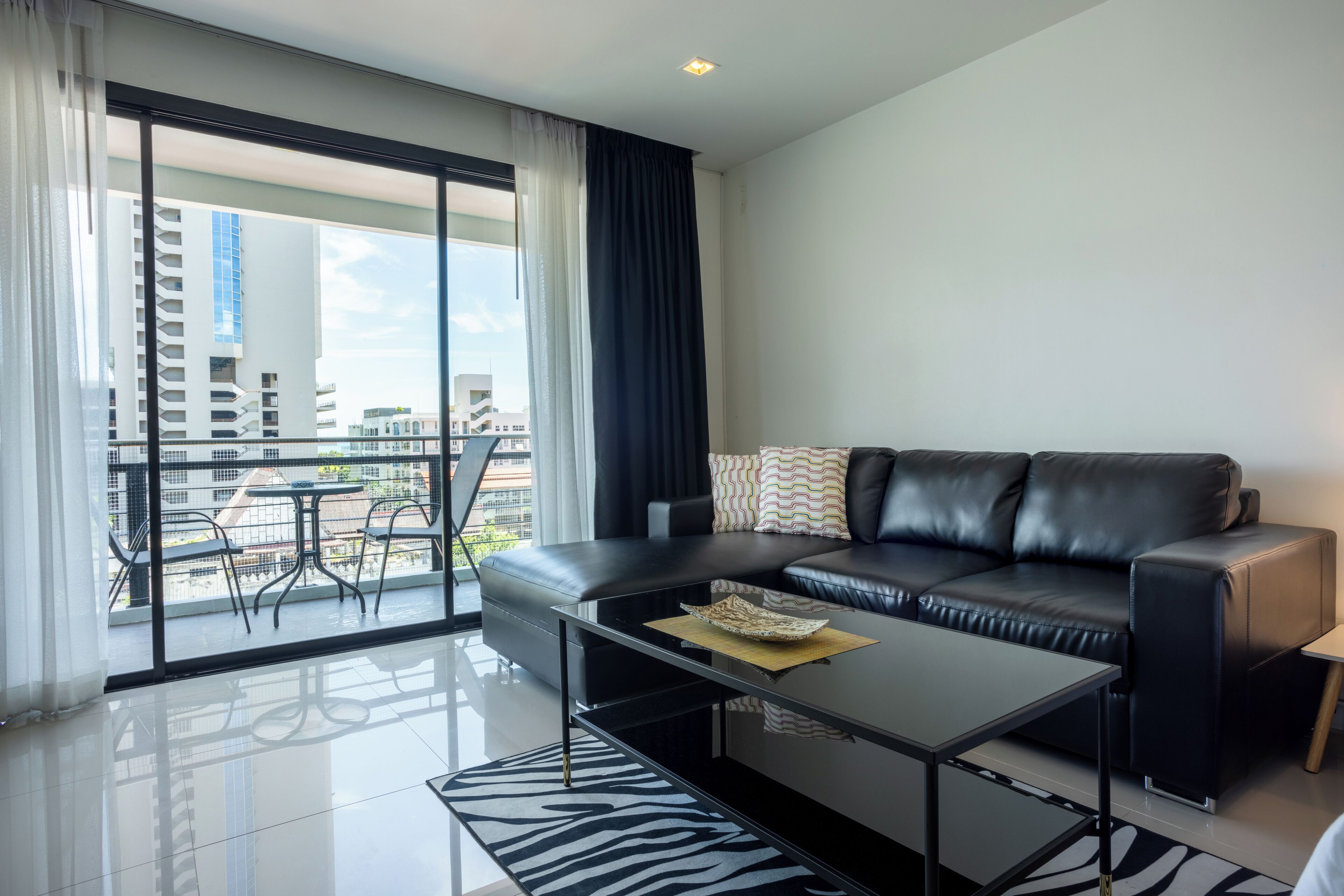 Deluxe Studio Suite, 1 King Bed | Living area | 42-inch flat-screen TV with cable channels, LCD TV, DVD player
