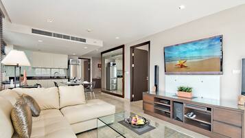 Luxury Apartment, 2 Bedrooms | Living room | 42-inch flat-screen TV with cable channels, LCD TV, DVD player