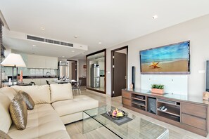Luxury Apartment, 2 Bedrooms | Living room | 42-inch flat-screen TV with cable channels, LCD TV, DVD player - Citismart Luxury Apartments (Pattaya)