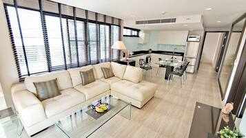 Luxury Apartment, 2 Bedrooms | Living area | 42-inch flat-screen TV with cable channels, LCD TV, DVD player