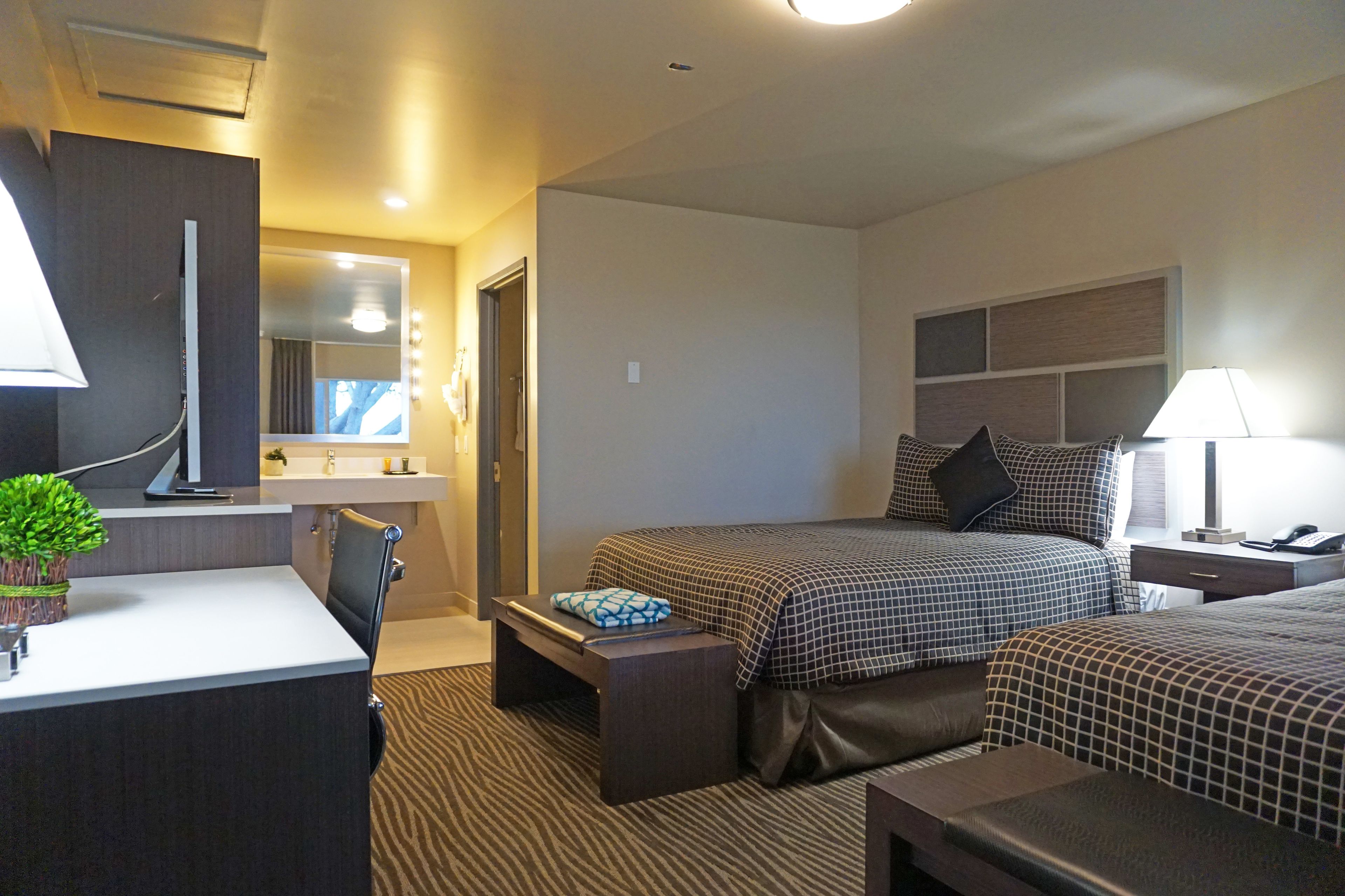 standard room, 2 queen beds | premium bedding, in-room safe, desk, iron/ironing board