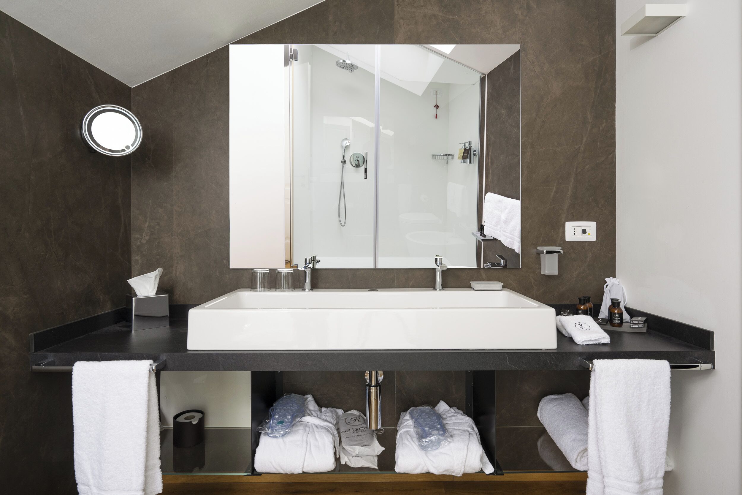 junior suite | bathroom | shower, rainfall showerhead, designer toiletries, hair dryer