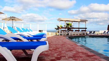 Outdoor pool, sun loungers