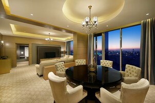 Deluxe Suite, 1 Bedroom | Living area | 42-inch LED TV with cable channels, TV, MP3 dock