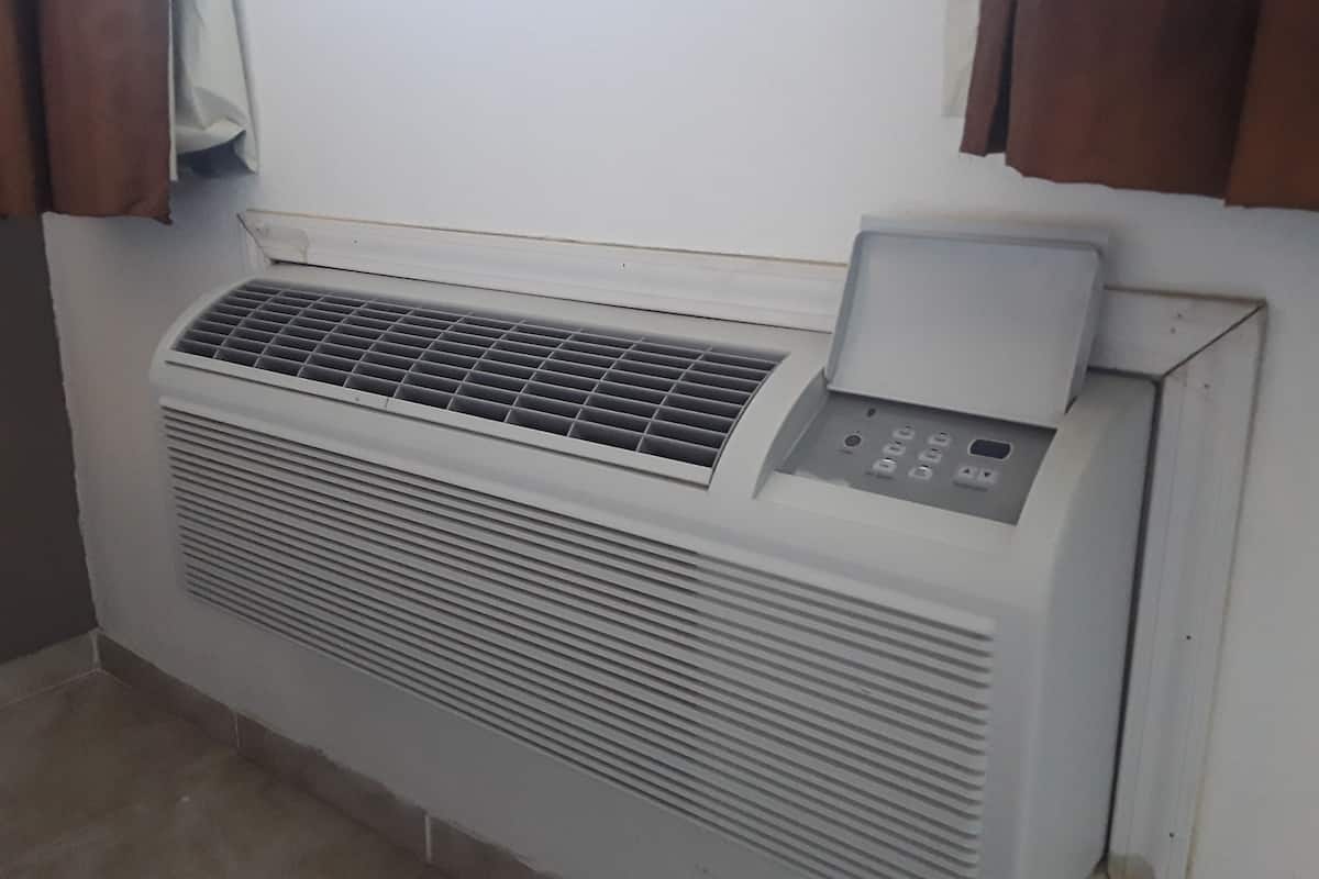 Down duvets, desk, laptop workspace, blackout curtains