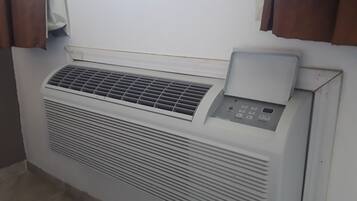 Down comforters, desk, laptop workspace, blackout drapes