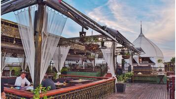 Rooftop bar, pool views, open daily