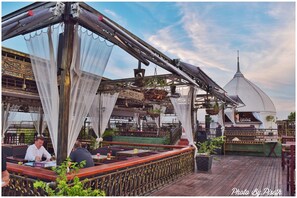 Rooftop bar, poolside views, open daily