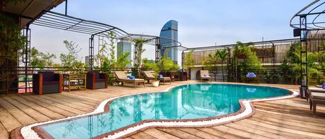 Outdoor pool, pool umbrellas, pool loungers