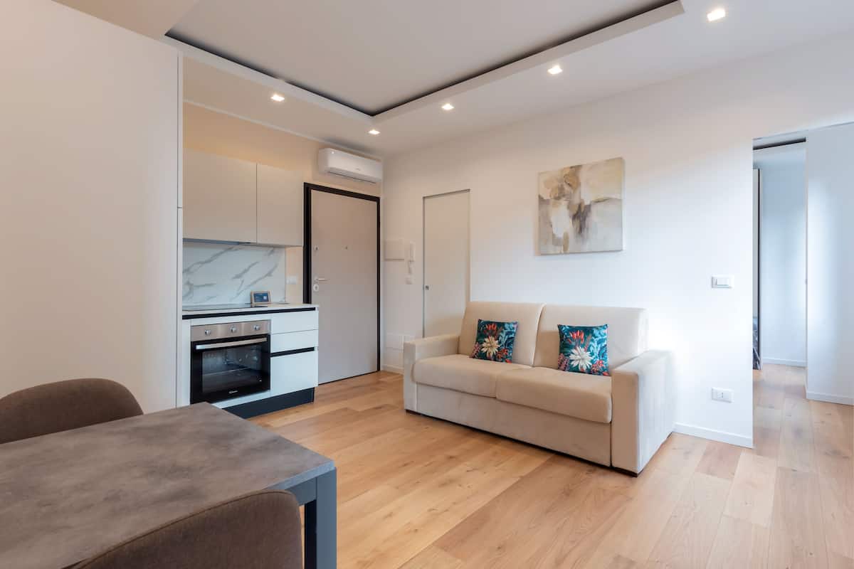 Exclusive Apartment Volturno Small (Via Volturno 31) | Living area | 43-inch LCD TV with digital channels, TV