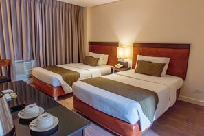 Ropa de cama de alta calidad y minibar 