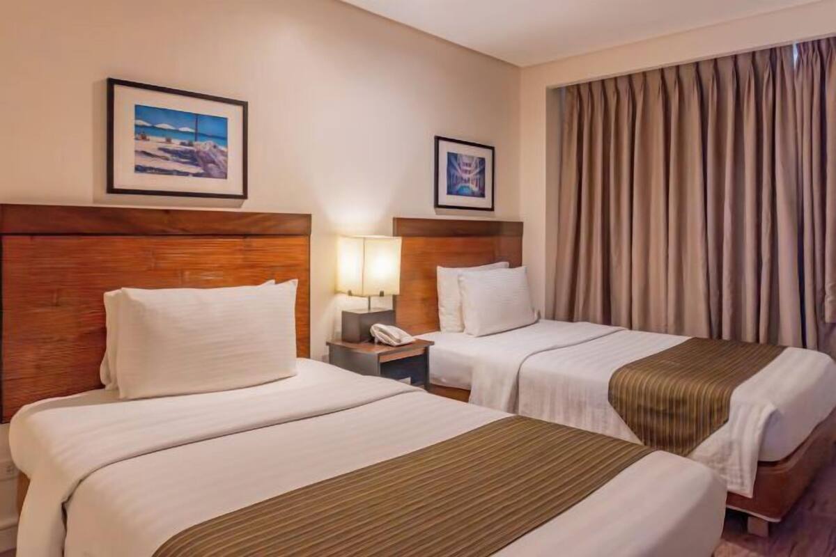 Ropa de cama de alta calidad y minibar