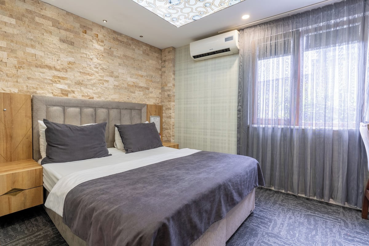 Grand suite | 1 slaapkamer, luxe beddengoed, een minibar, een kluis op de kamer