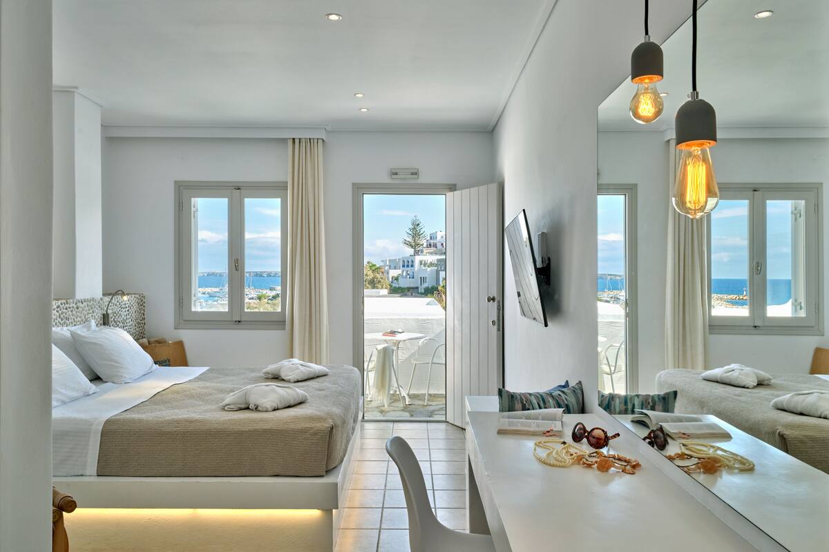 superior room, balcony, partial sea view | 1 bedroom, premium bedding, in-room safe, iron/ironing board