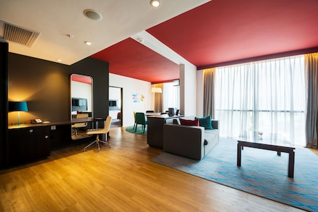 Premium bedding, down comforters, pillowtop beds, in-room safe