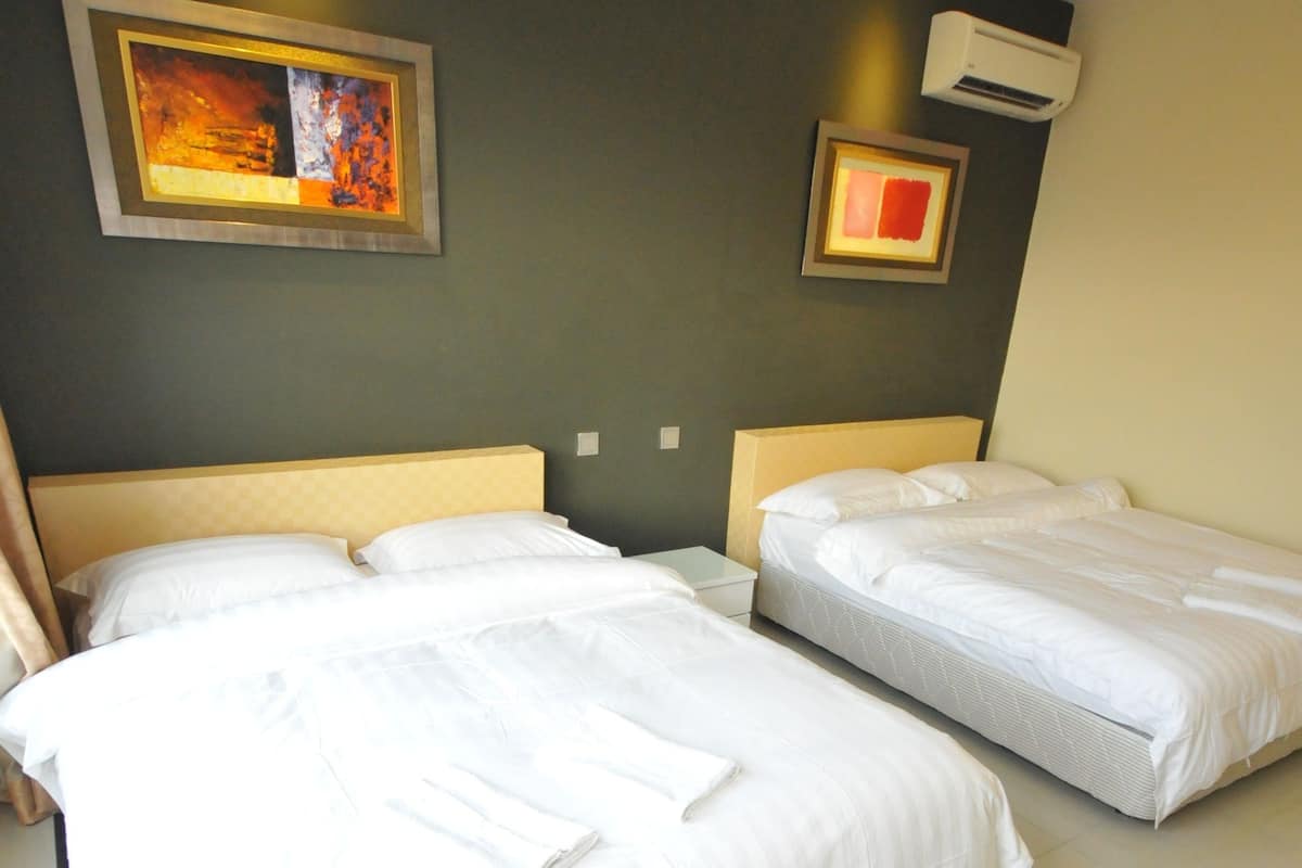 Deluxe tweepersoonskamer, 2 queensize bedden | Een kluis op de kamer, gratis wifi, beddengoed