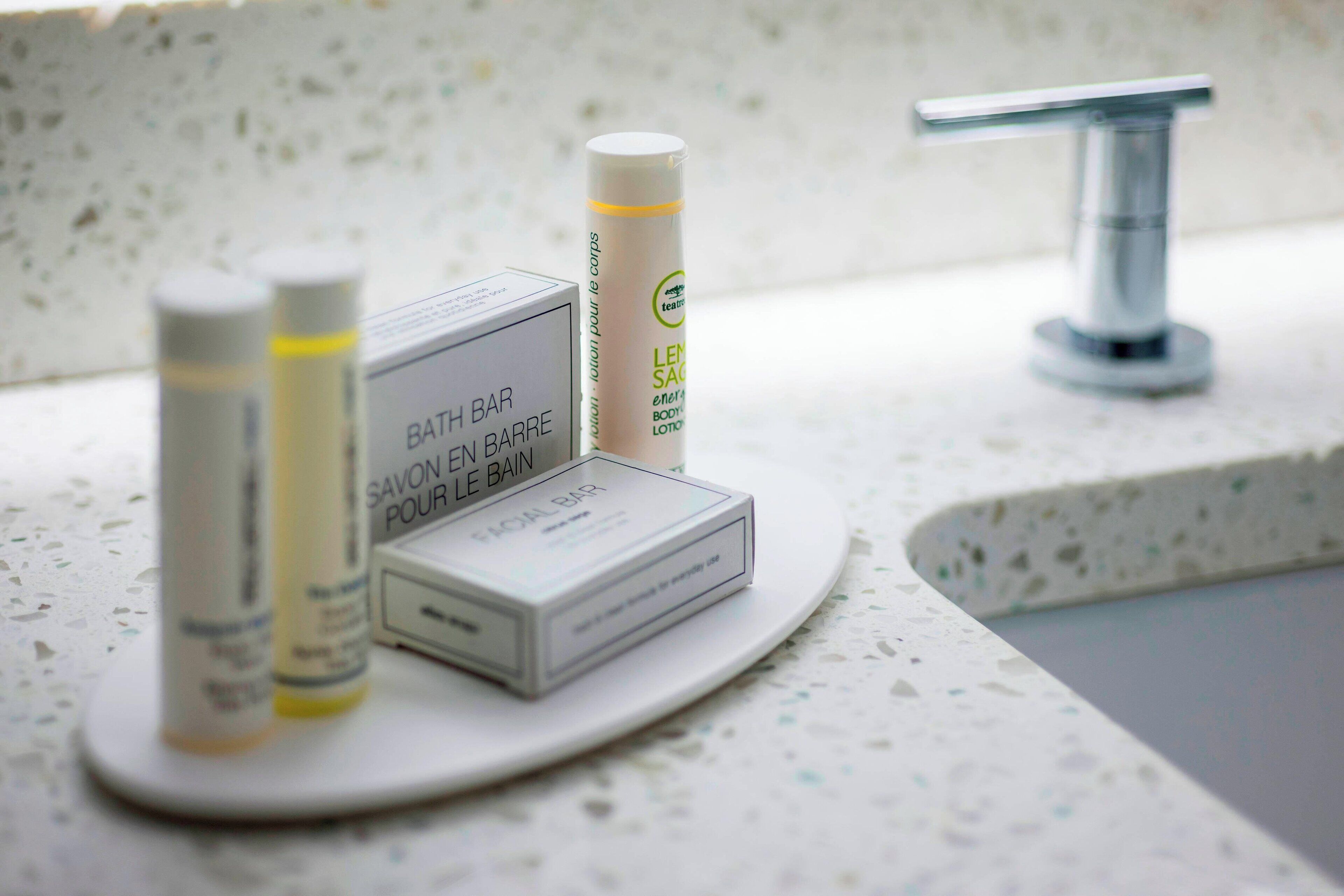 shower, designer toiletries, hair dryer, towels