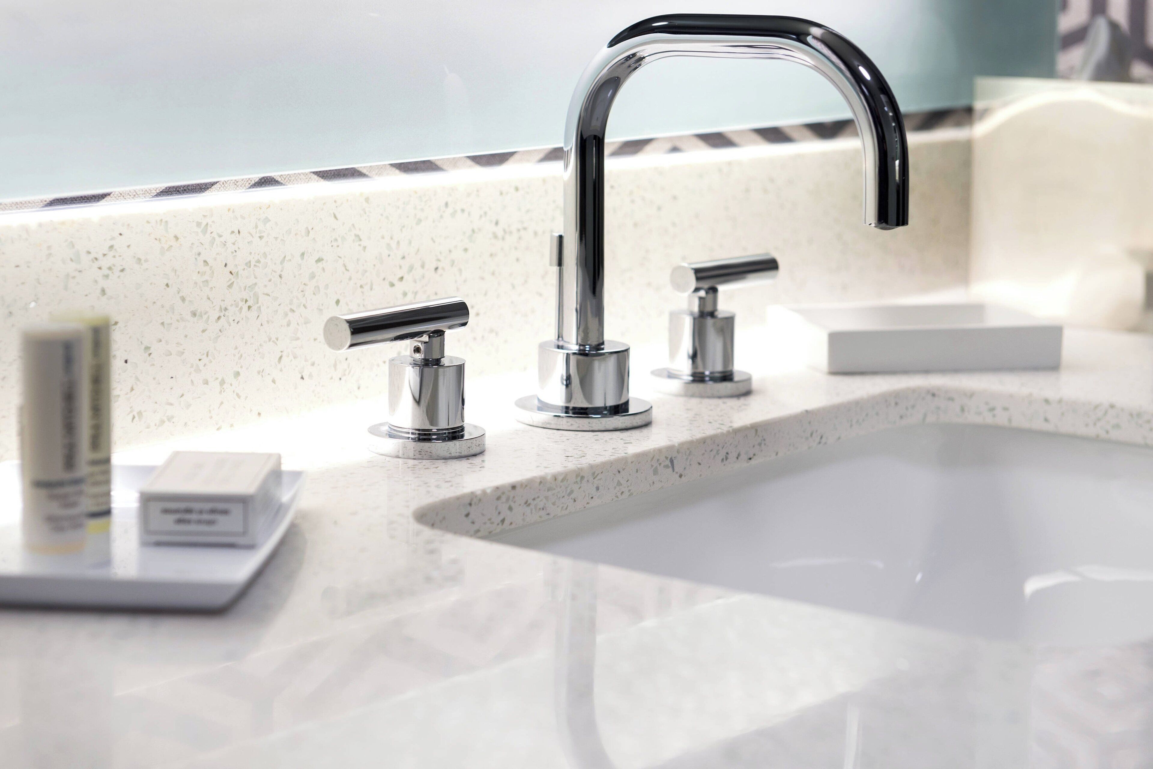 shower, designer toiletries, hair dryer, towels