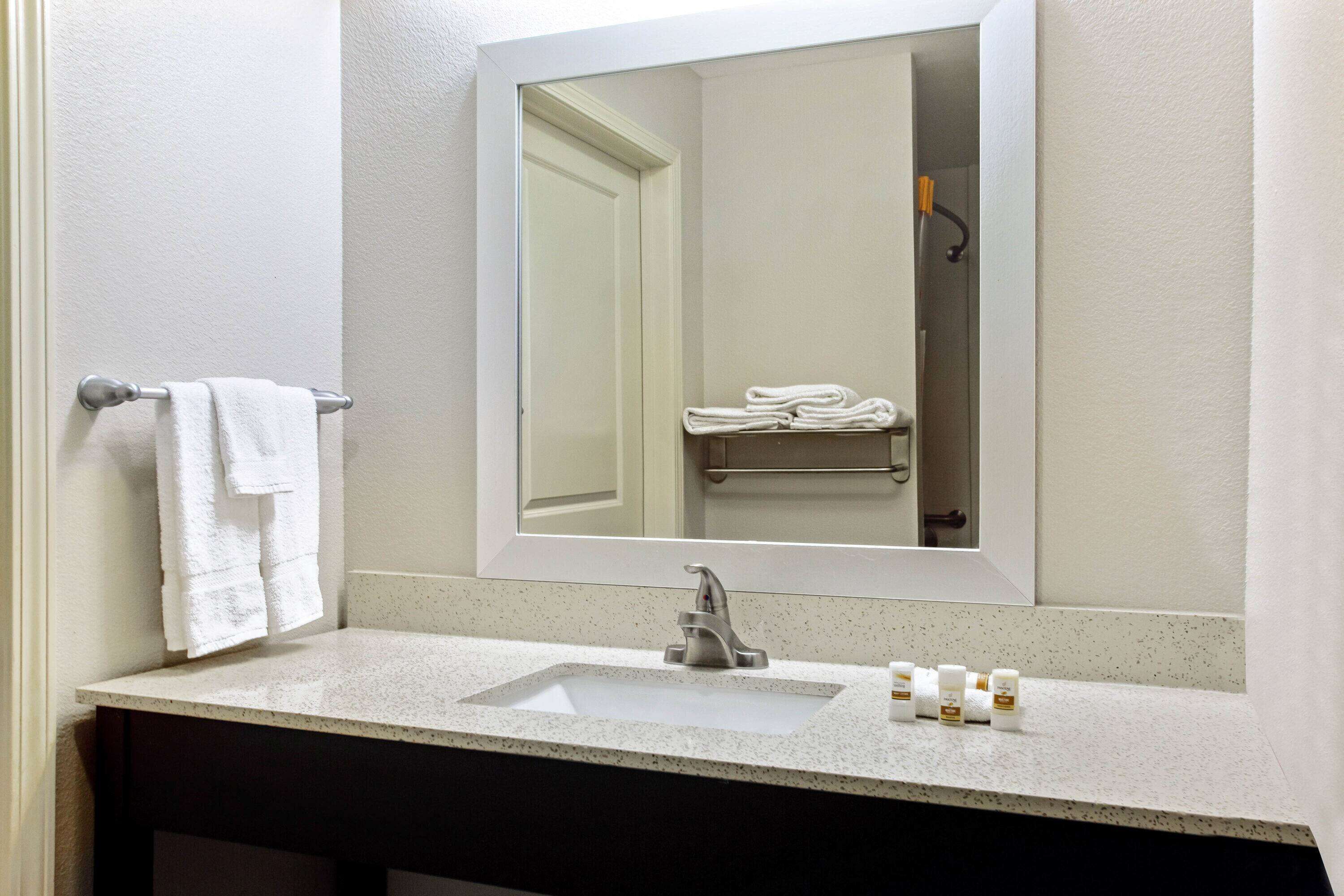 combined shower/bathtub, free toiletries, hair dryer, towels