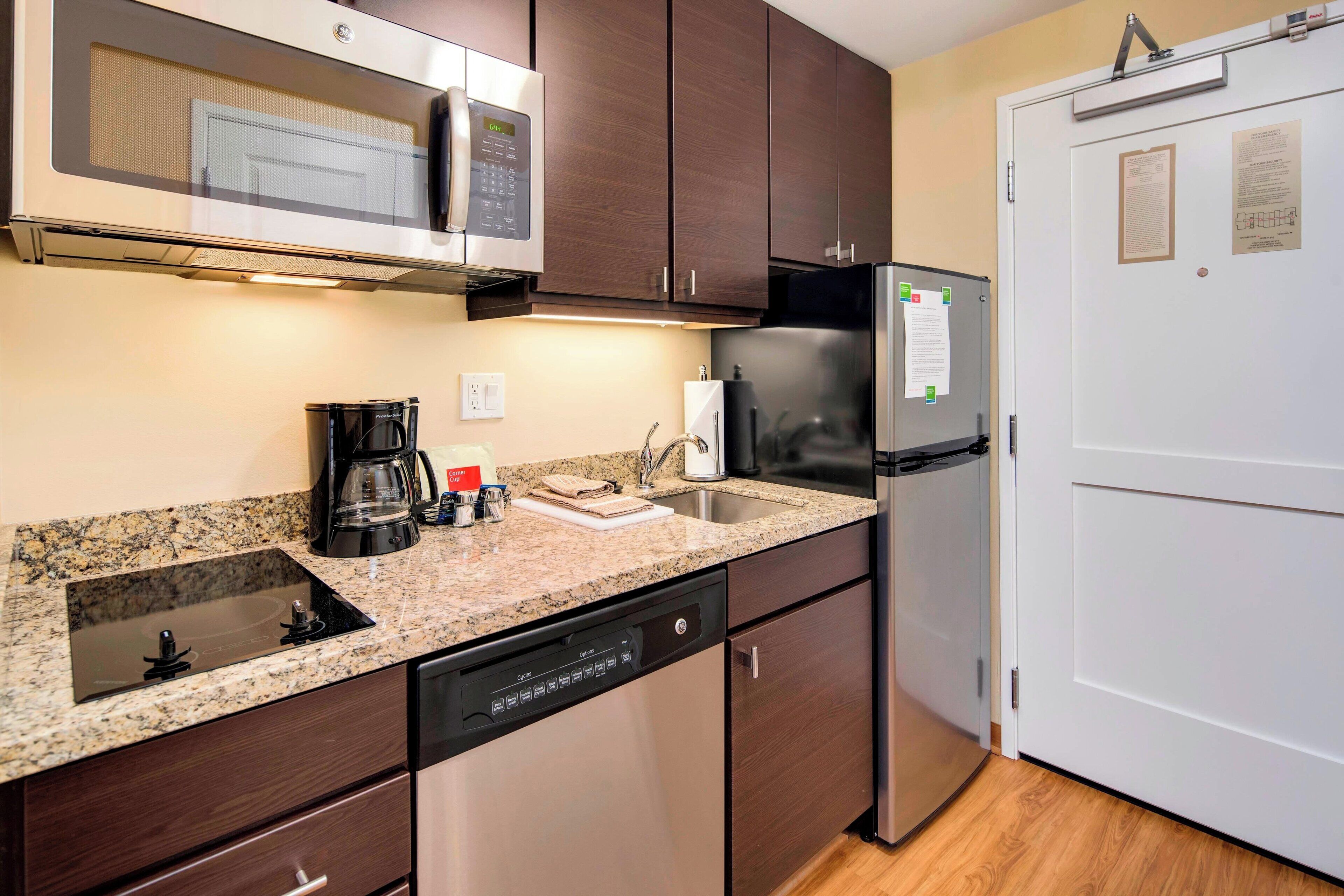 studio, 1 king bed with sofa bed | private kitchen | full-sized fridge, microwave, stovetop, dishwasher