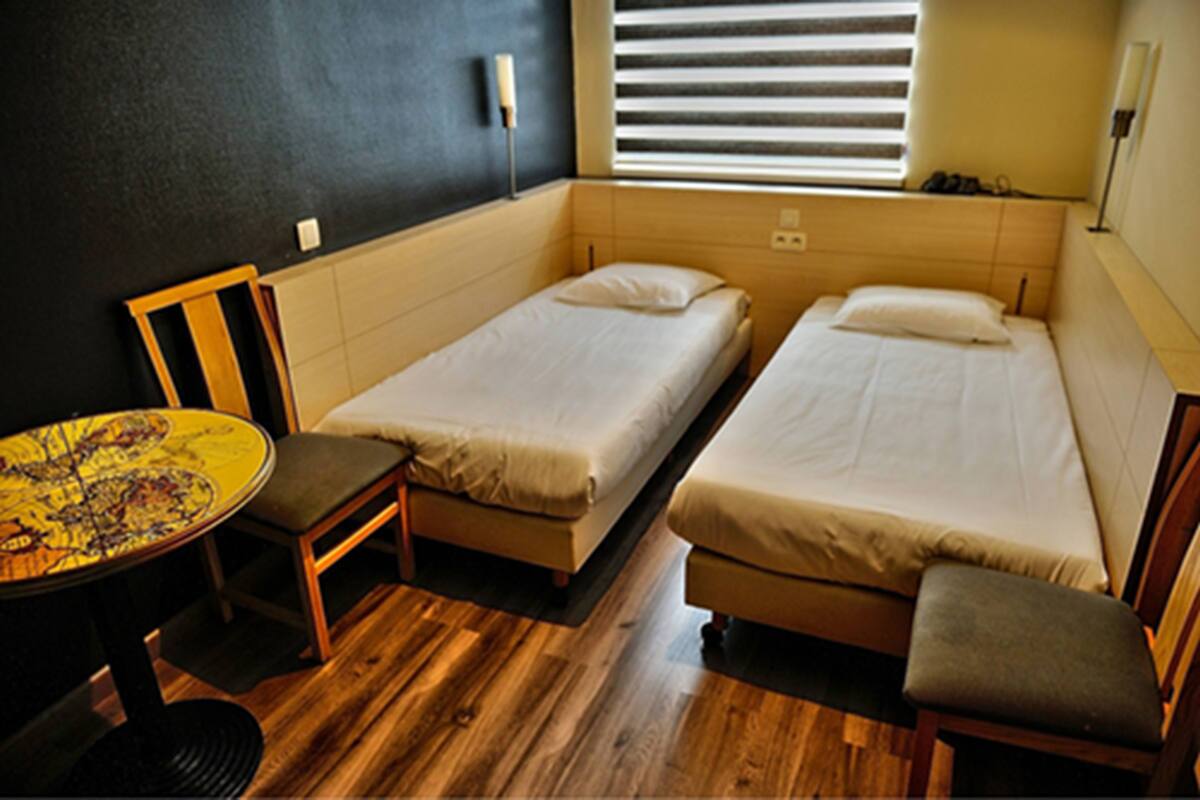Twin Room | 1 bedroom, desk, WiFi (free), bed sheets