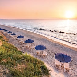 On the beach, sun loungers, beach umbrellas, beach towels