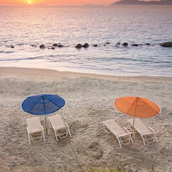 On the beach, sun loungers, beach umbrellas, beach towels