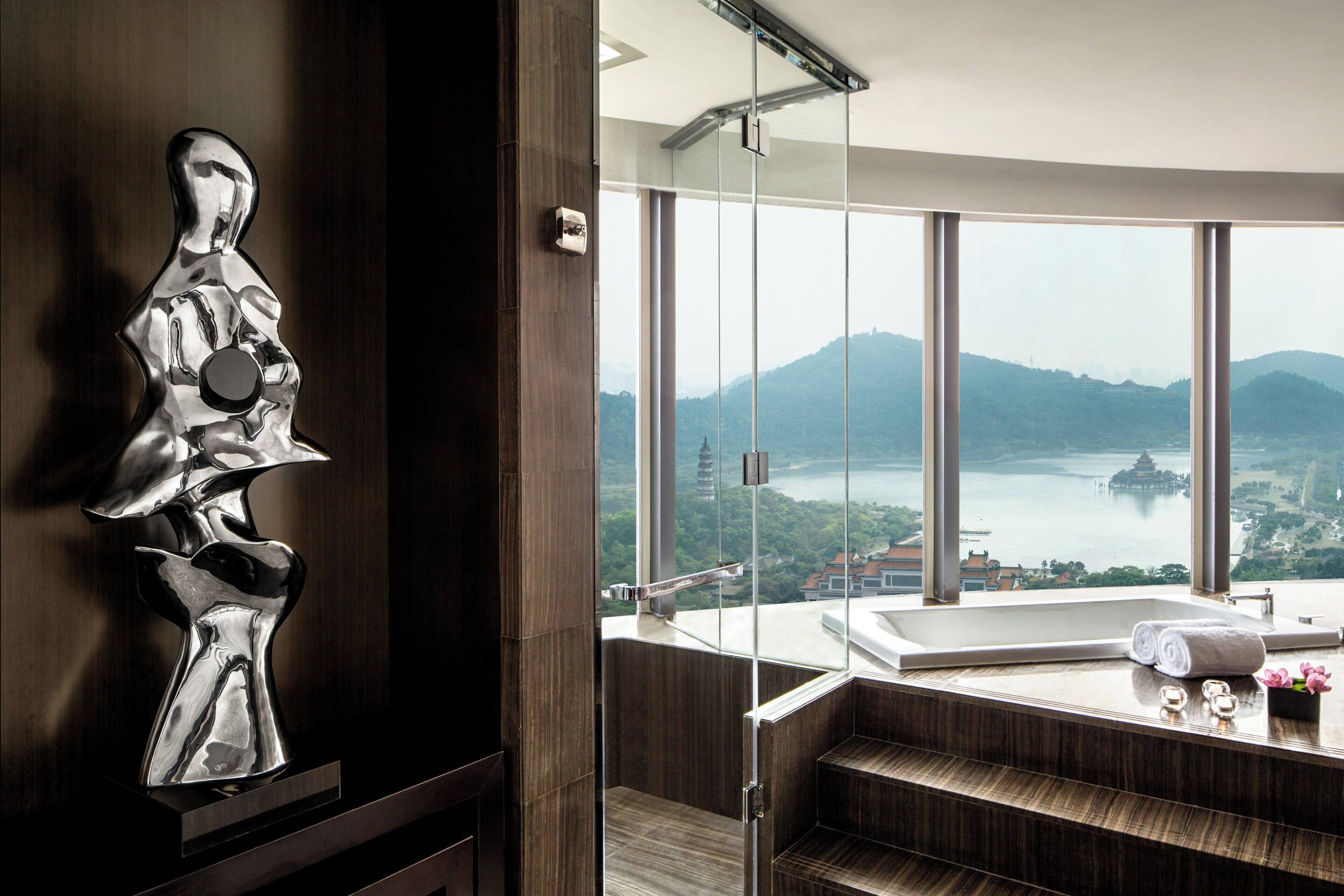 separate bathtub and shower, jetted bath, rainfall showerhead