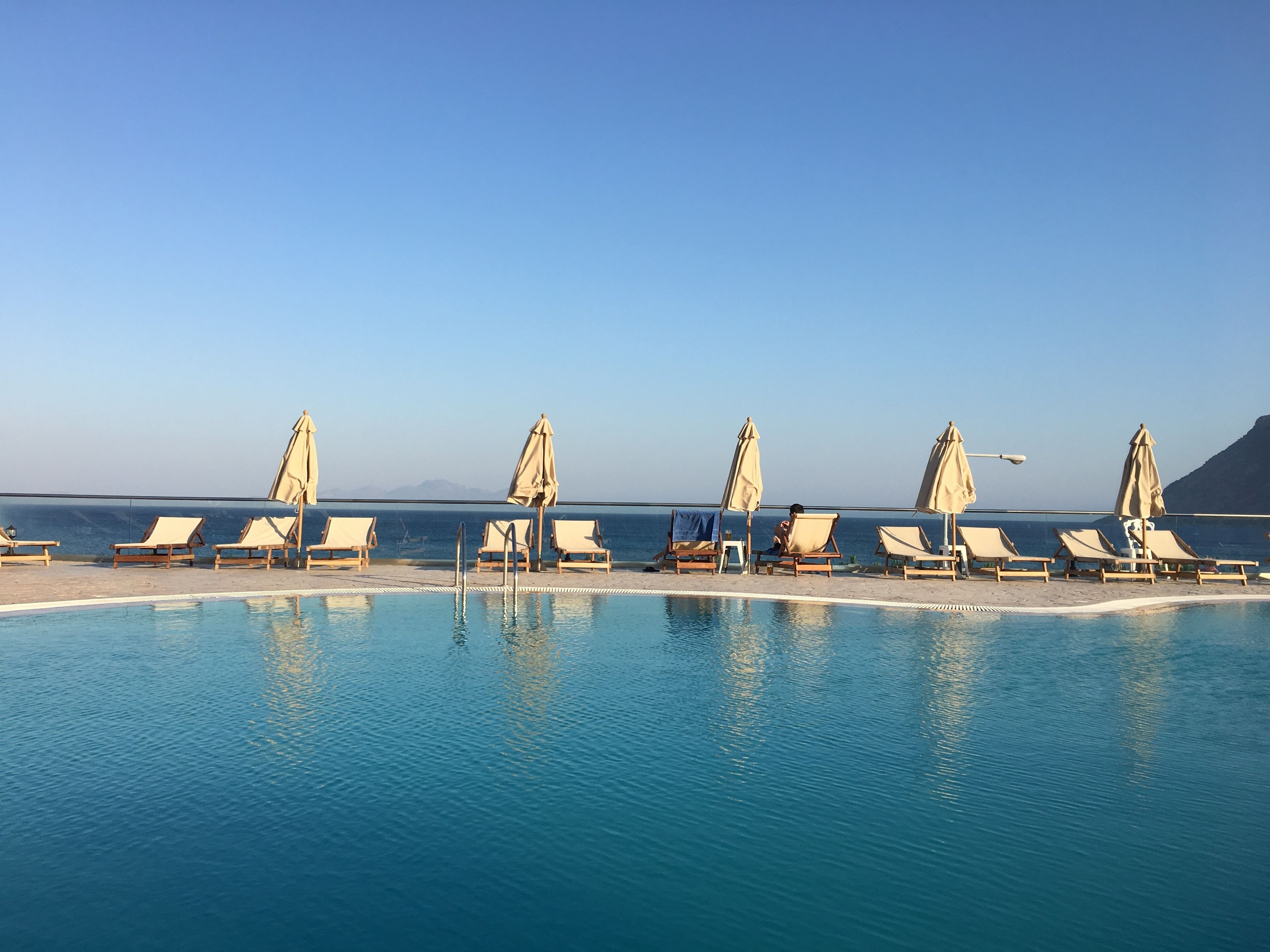 Outdoor pool, pool umbrellas, pool loungers