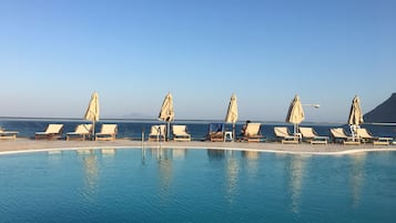 Outdoor pool, pool umbrellas, pool loungers
