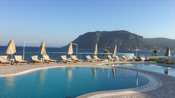 Outdoor pool, pool umbrellas, pool loungers