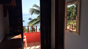 Suite, Beach View | 1 bedroom, desk, bed sheets