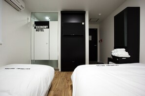 Standard Triple Room (without Window) | Iron/ironing board, free WiFi