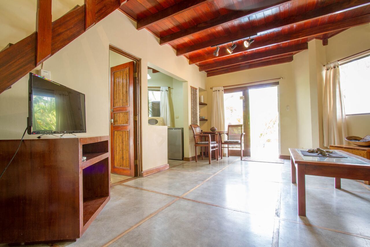 bungalow, 1 bedroom, ocean view | living area | 30-inch lcd tv with digital channels
