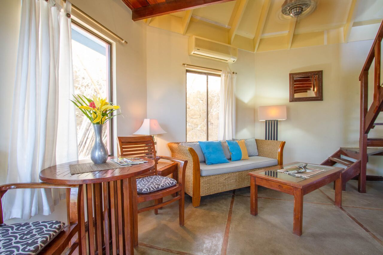 bungalow, 1 bedroom, ocean view | living area | 30-inch lcd tv with digital channels