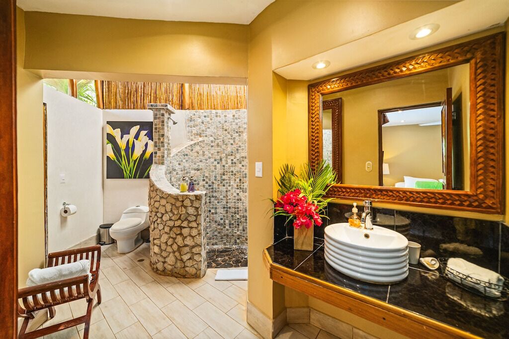 bungalow, 1 bedroom, ocean view | bathroom | shower, free toiletries, hair dryer, towels