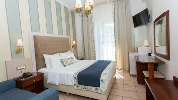 Double or Twin Room | Minibar, in-room safe, desk, blackout drapes