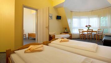 Family Room | Hypo-allergenic bedding, desk, blackout curtains, soundproofing