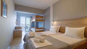 Desk, travel crib, free WiFi, bed sheets