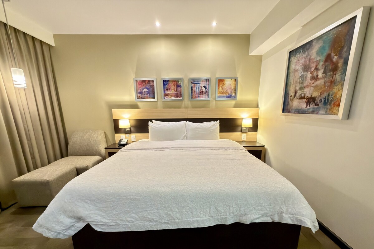 Room, 1 King Bed, Kitchenette | In-room safe, desk, laptop workspace, blackout curtains