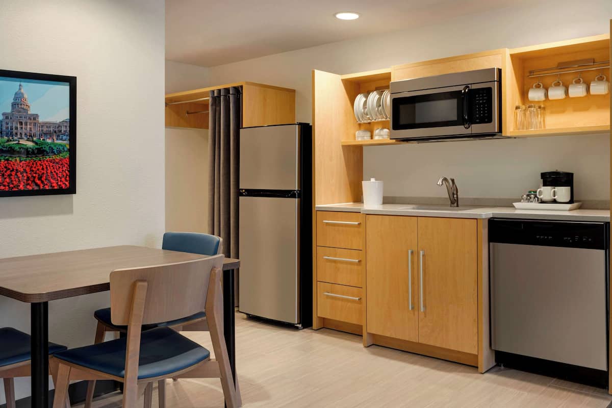 suite, 1 king bed, non smoking | private kitchen | full-sized fridge, microwave, dishwasher, coffee/tea maker